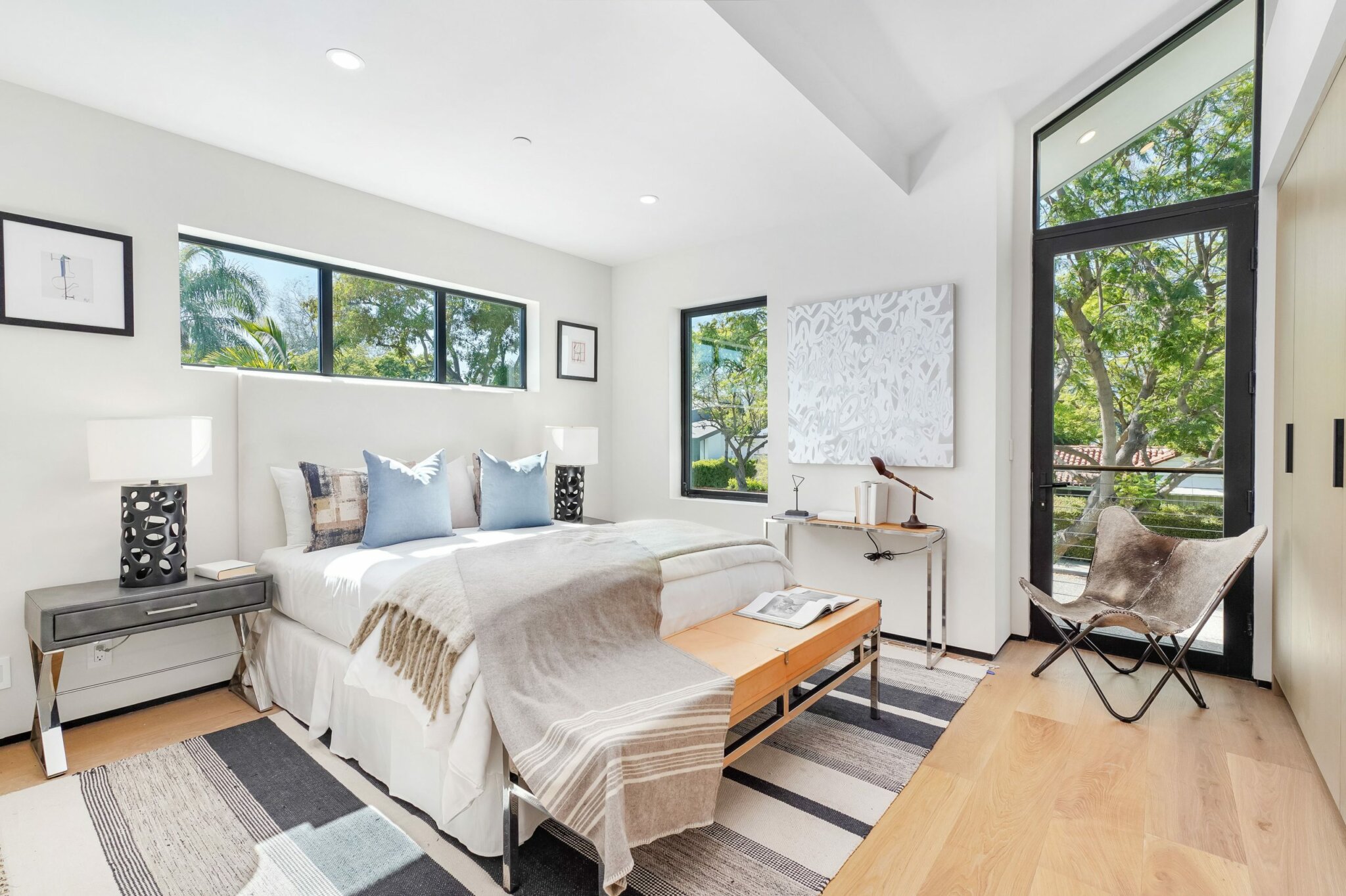 Bedroom at Ashcroft, lit by a clerestory ribbon above the bed, by Apel Design