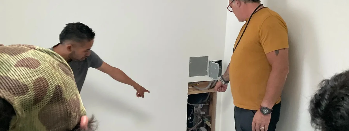 Reviewing a wall opening during construction on an Apel Design project