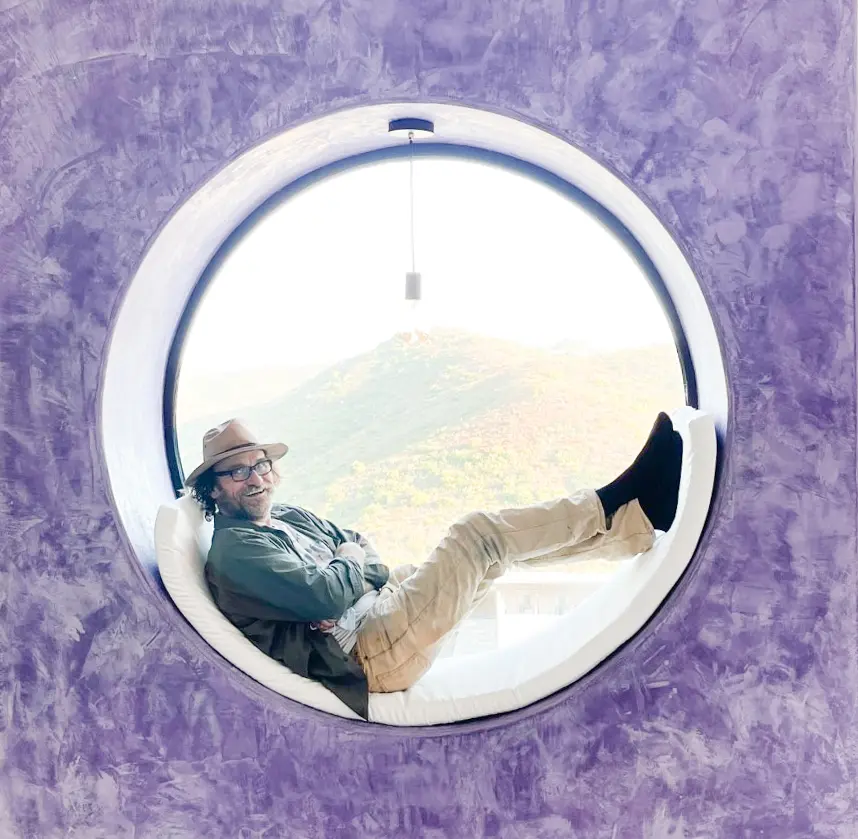 The studio's round window seat, overlooking the Malibu hills