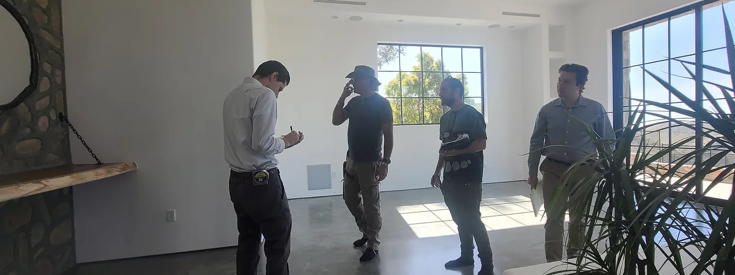 The team walking a completed interior