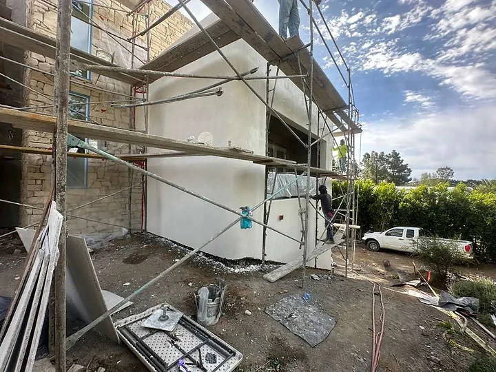 Plaster work in progress on the exterior at The Blue