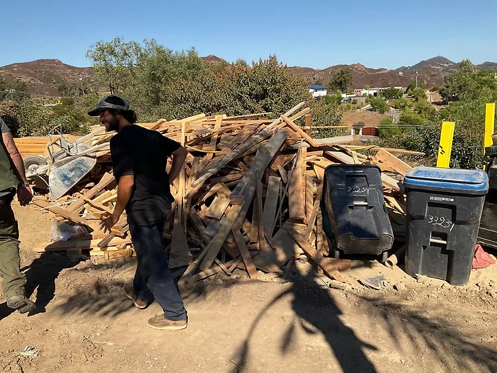 Sorting and clearing scrap lumber on site