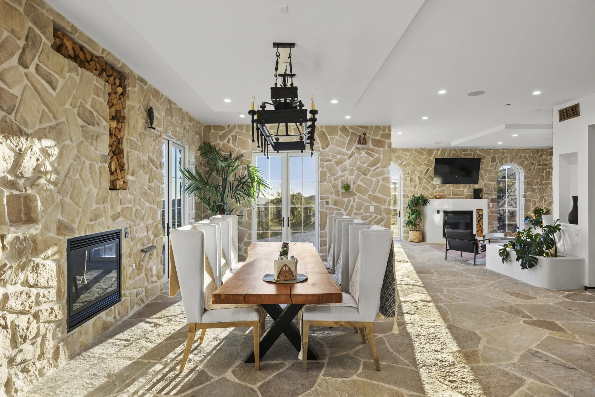Living and dining spaces connected through one material language