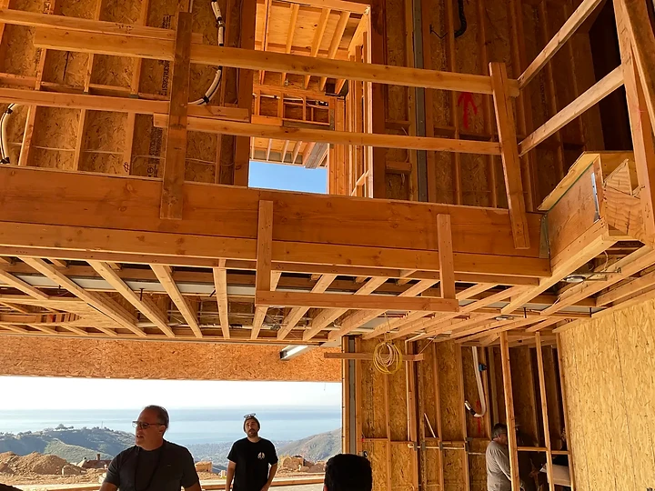 Looking up at framing from below during construction