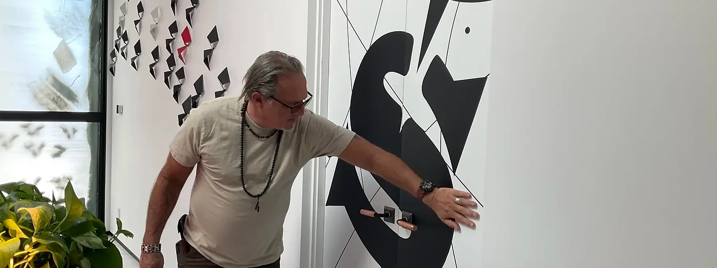 Explaining a wall installation during a site walk