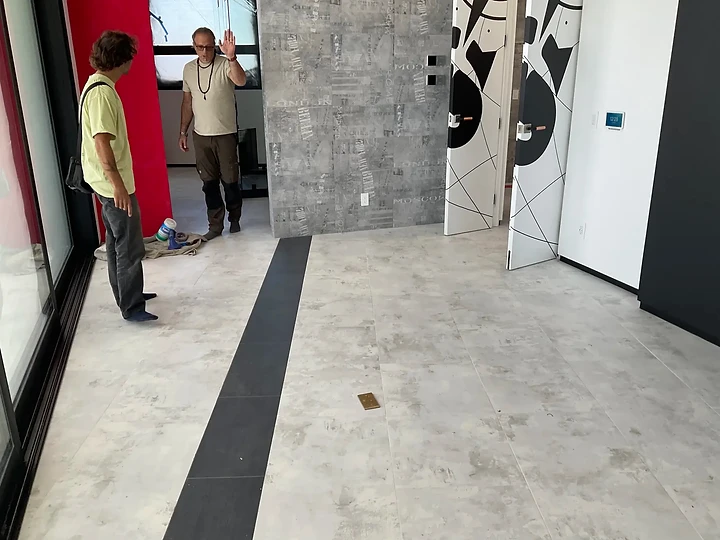 Reviewing a concrete wall during finish work