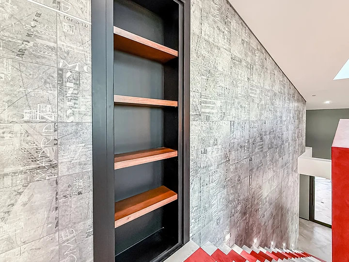 Built-in wood shelving niche at The Aviator