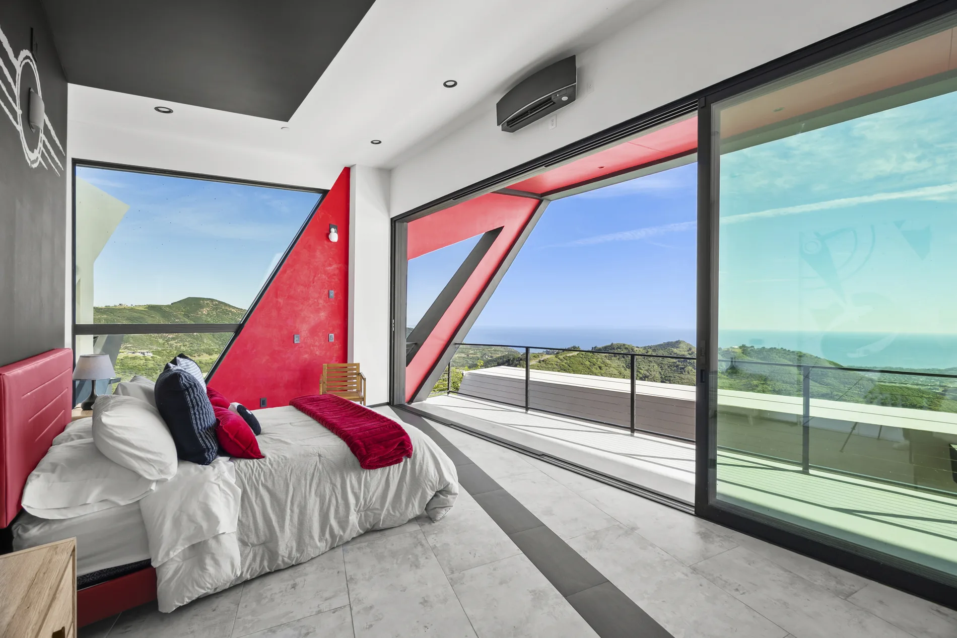 Primary bedroom suite connected to landscape and light