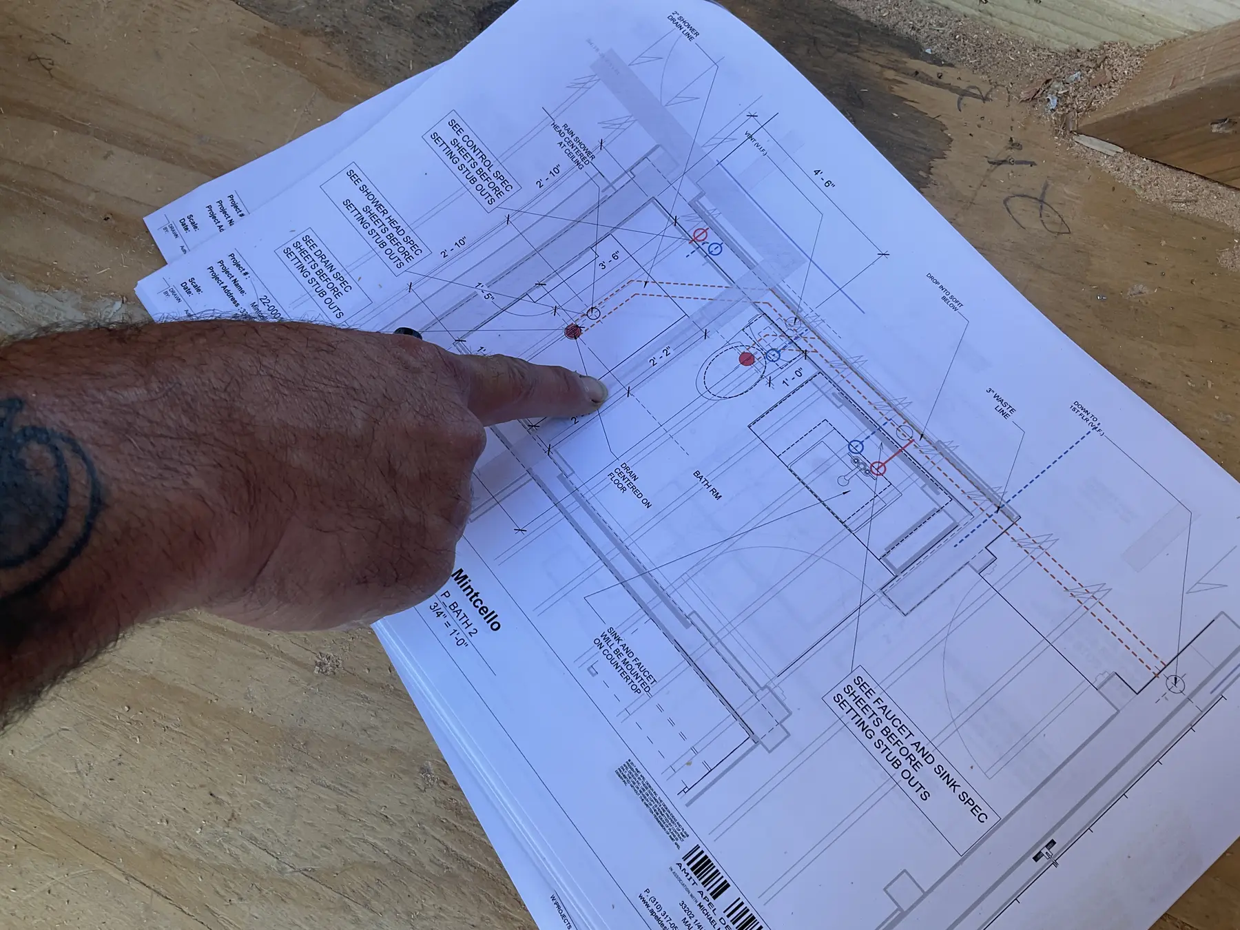 Reviewing construction drawings on site