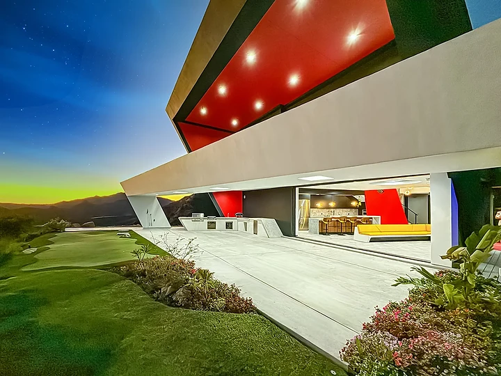 Luxury pool and outdoor entertaining area at night