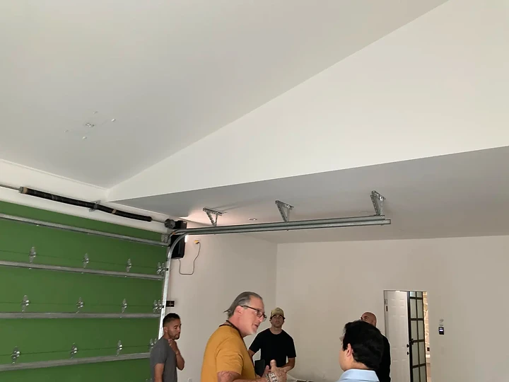 Reviewing a garage interior during finish work