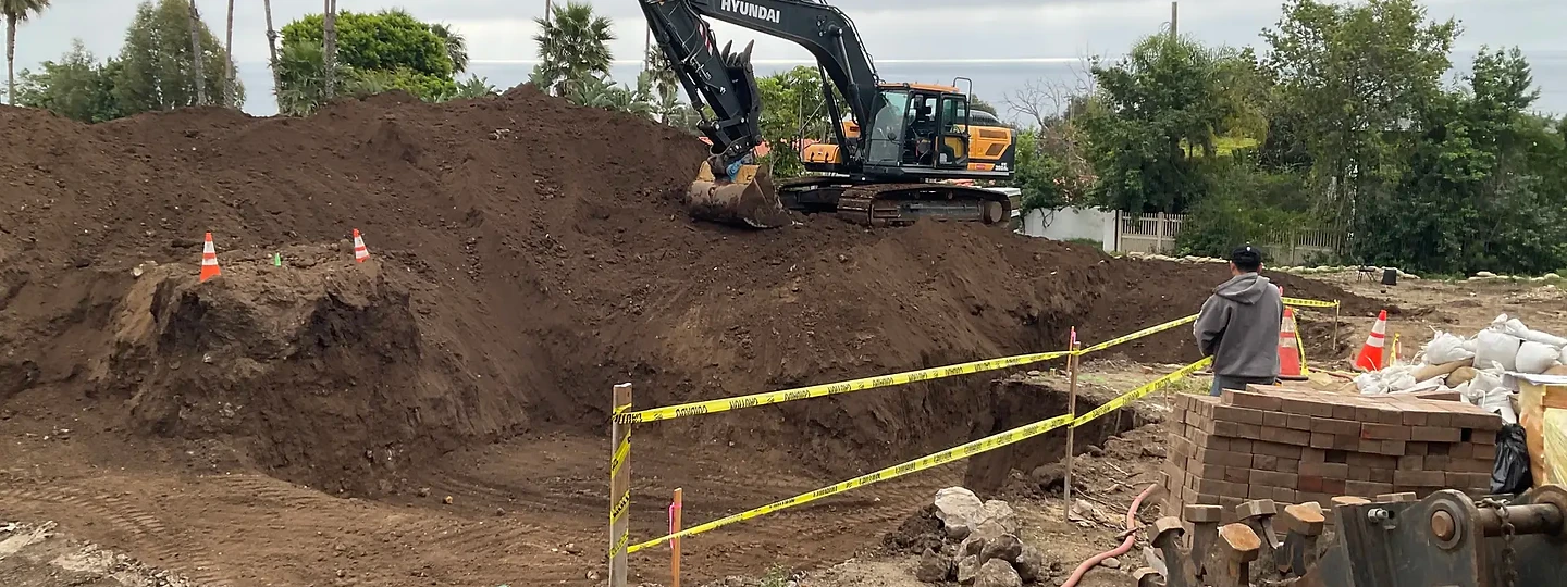 Excavation under way at Surfside, with the ocean beyond