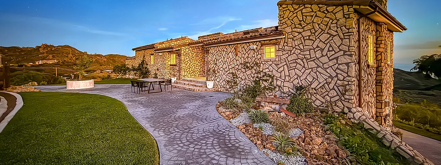 Water, architecture and landscape composed as one outdoor room