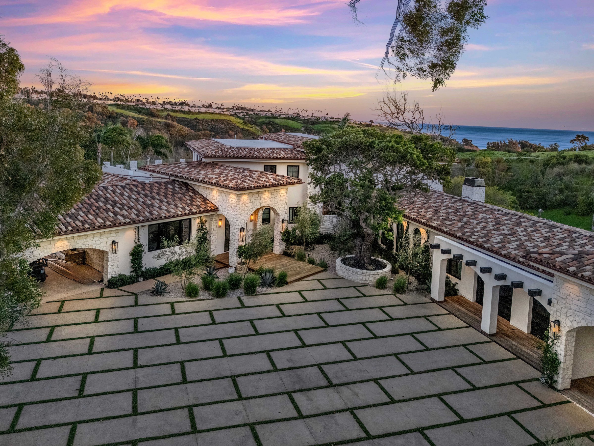 The motor court and the garage wings from above, at dusk, Merritt Estate in Malibu by Apel Design