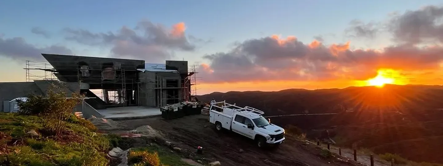 The Aviator at dusk, exterior nearing completion