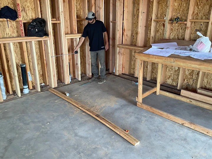 Working from a plan table inside a framed room