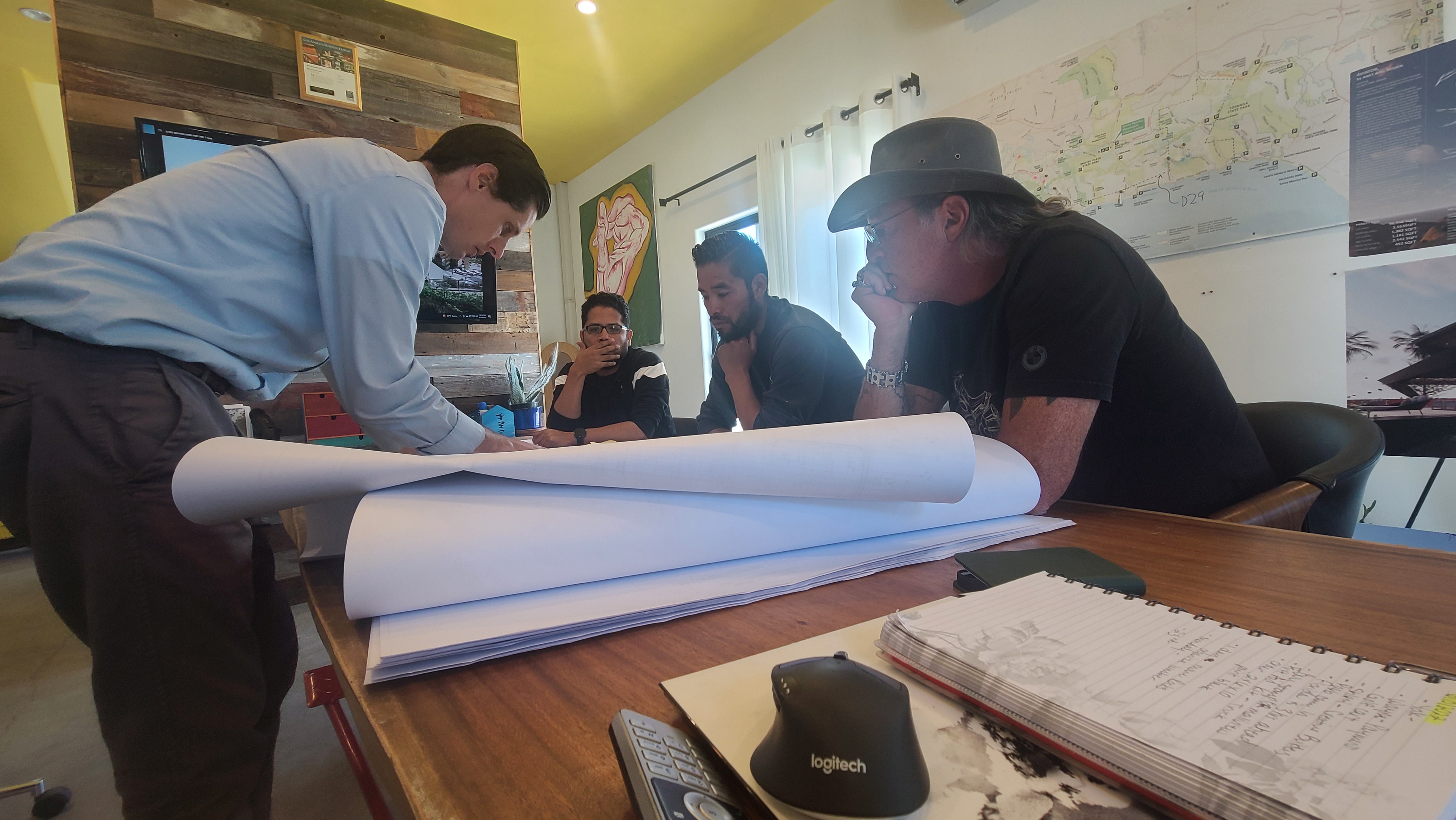 Reviewing architectural plans together on site