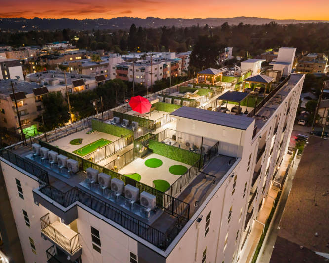 Roof terrace of Bakman Housing at dusk, by Apel Design