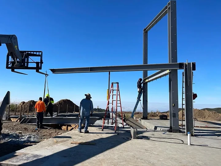 Setting a steel beam during structural framing