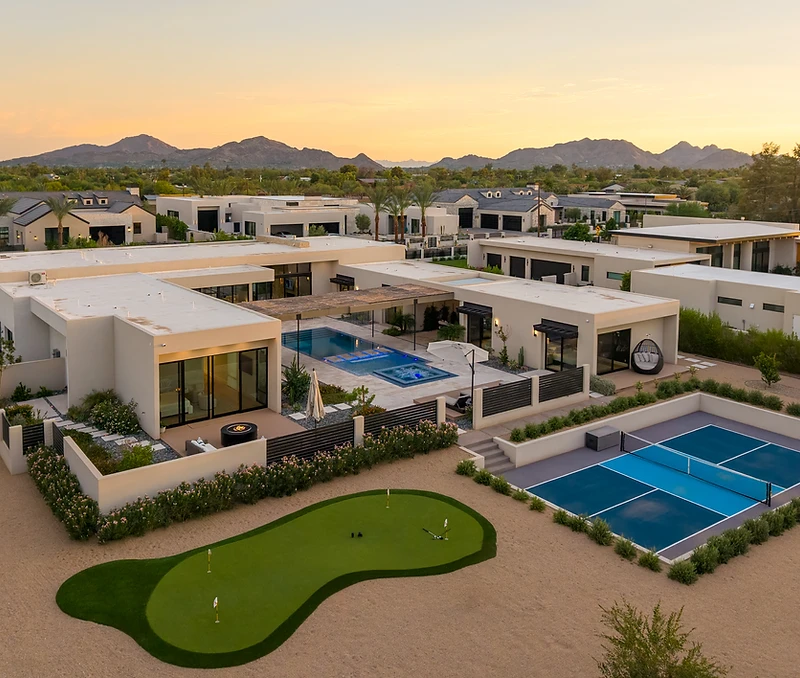 Aerial view of the Paradise Reserve backyard with heated pool, hot tub, and pickleball court in North Scottsdale, Arizona