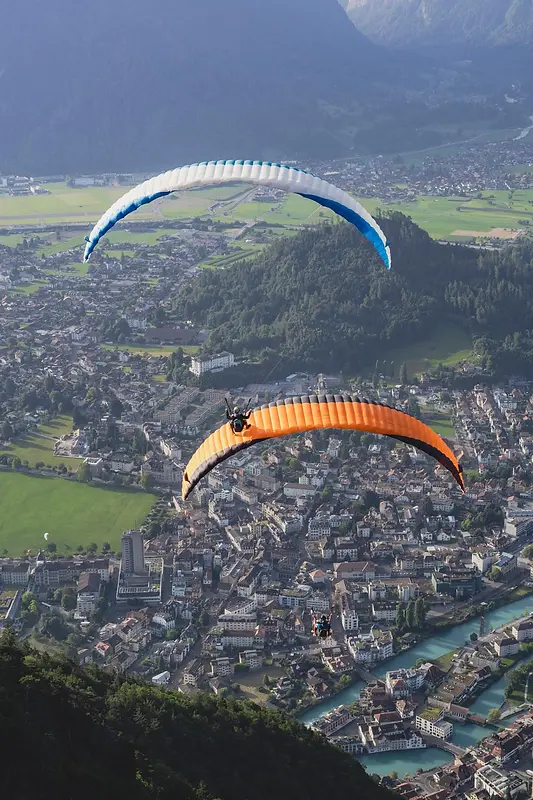 Experience Thrilling Tandem Paragliding Over Interlaken's Scenic Beauty