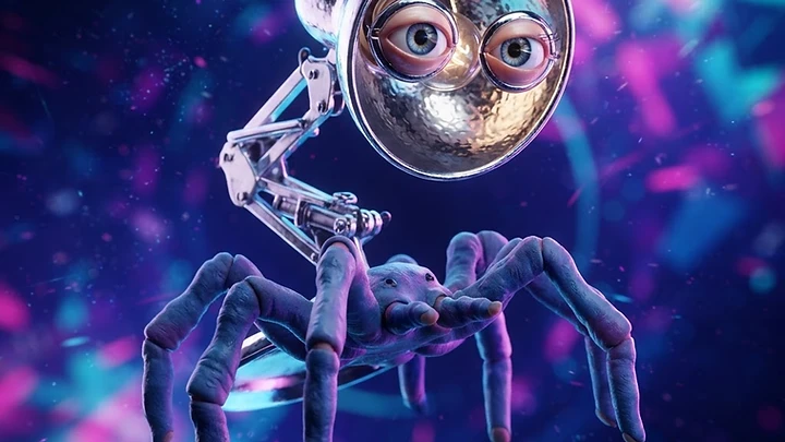 A surreal creature with the metallic body and articulated arm of a desk lamp, featuring two realistic human eyes inside its head and a purple spider-like body with multiple legs, floating against a vibrant neon blue and pink background.