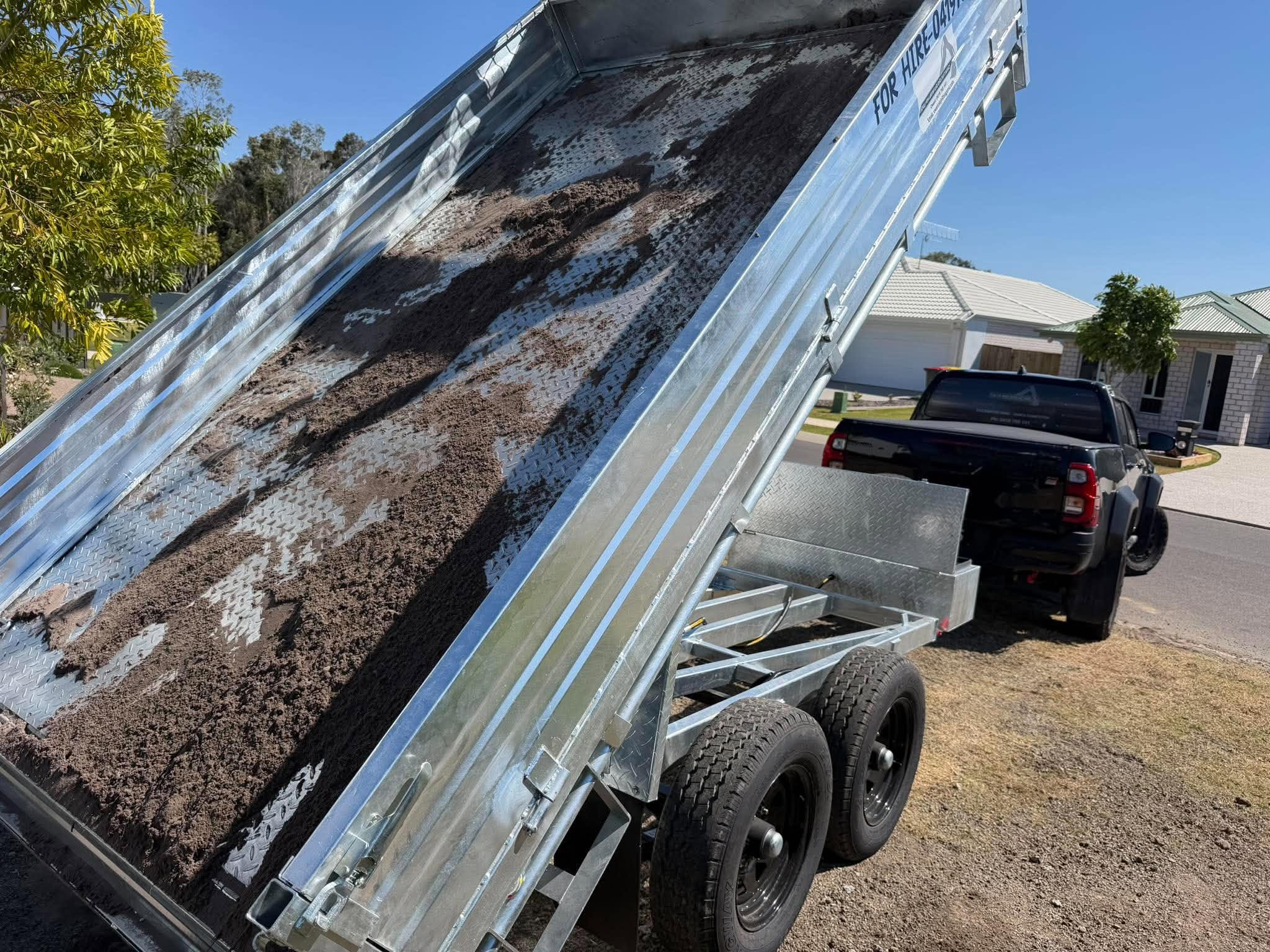 Tipper unloading soil