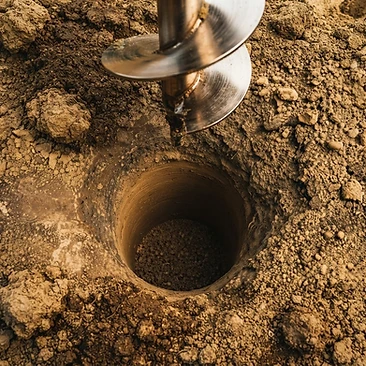 Post hole drilling — clean auger bore