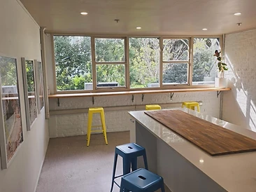 The kitchen — island and window bar