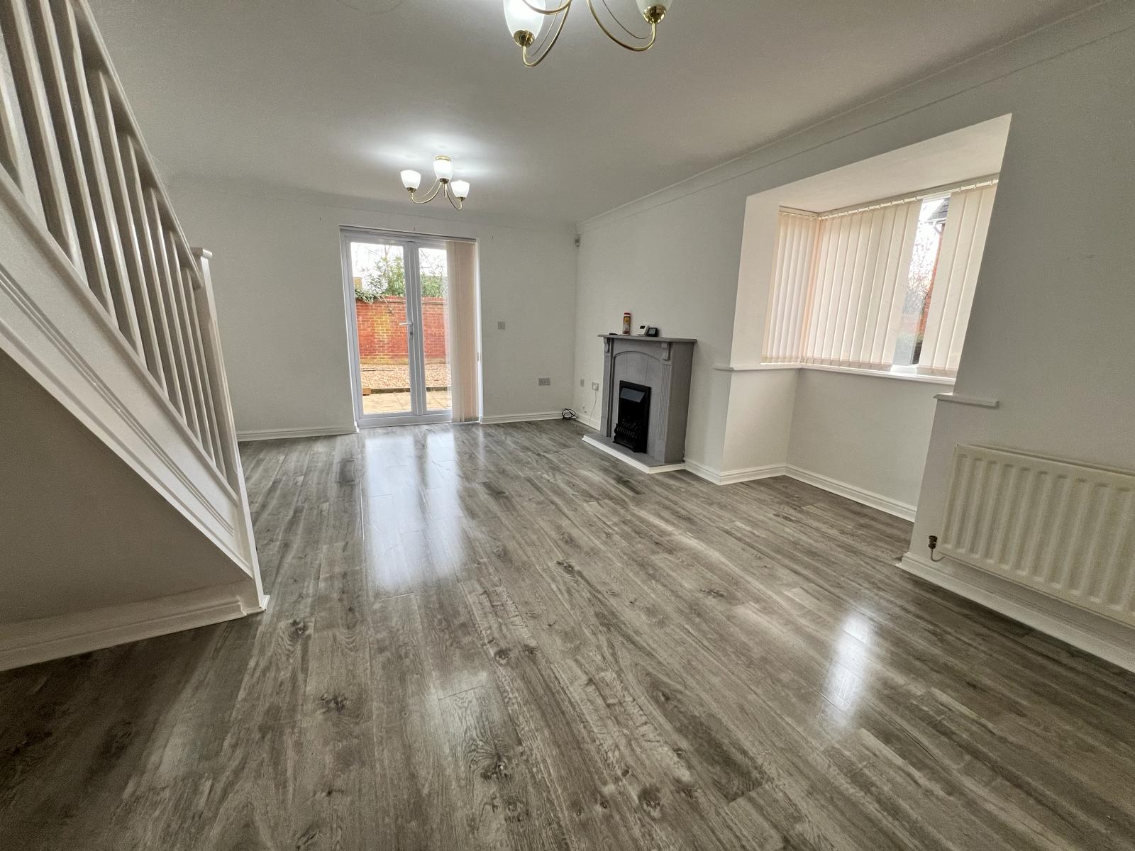 Empty living room deep cleaned before handover by GRID CITY CLEANING Milton Keynes