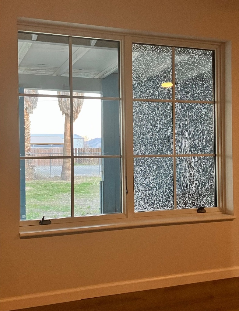 Impact-damaged grid window — Honey Glass AZ