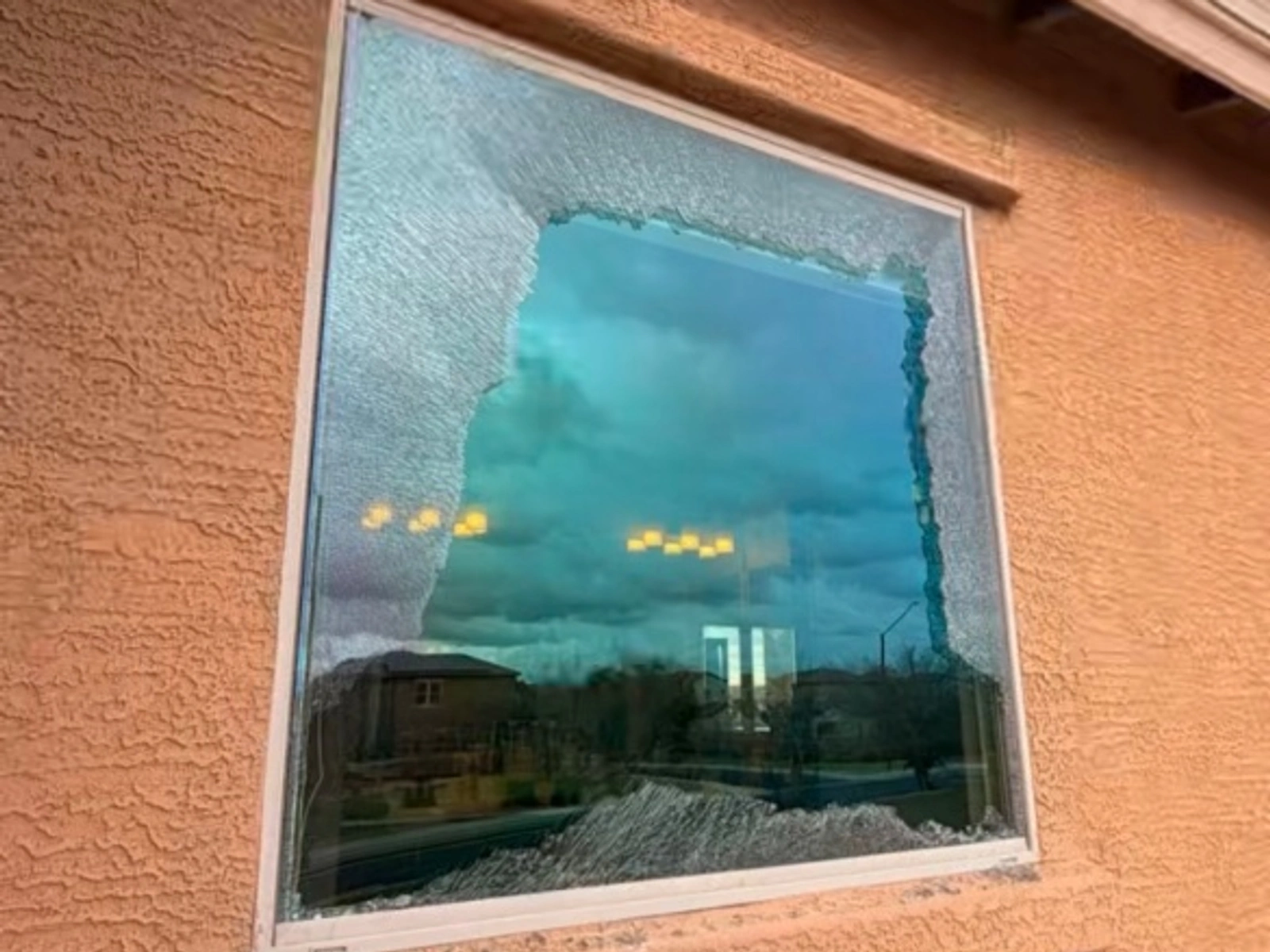 Shattered window pane replaced by Honey Glass AZ - before