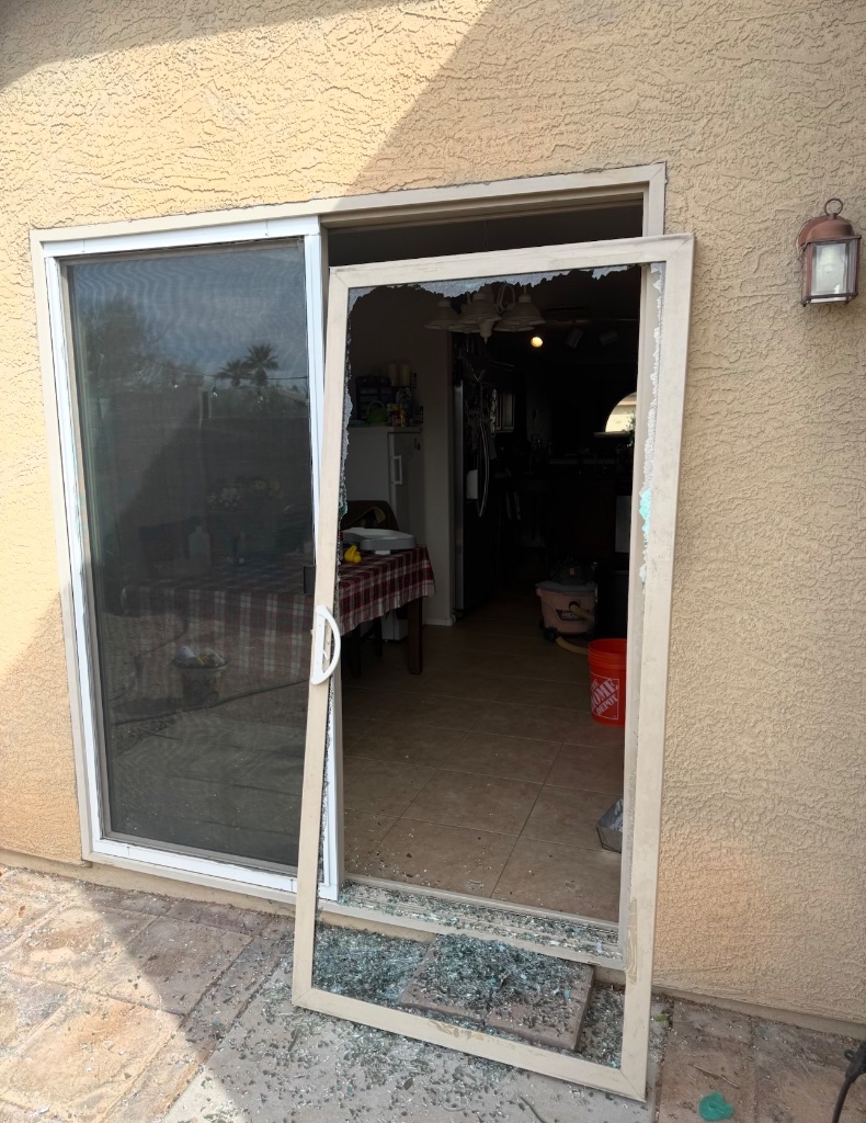 Sliding door board-up before — Honey Glass AZ