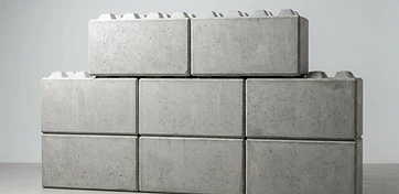 Interlocking Lego-style precast concrete retaining wall blocks