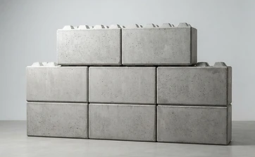 Interlocking Lego-style precast concrete retaining wall blocks