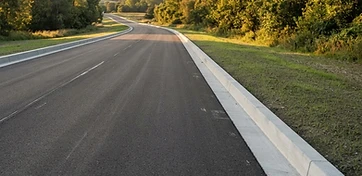 Curb stones along a paved road