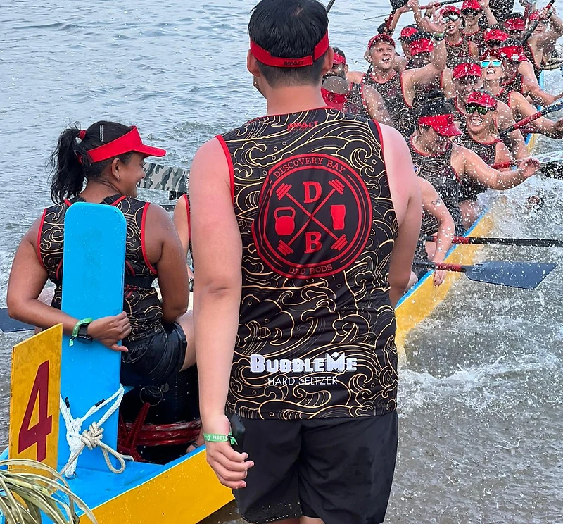 DBDB team paddling the dragon boat in Discovery Bay