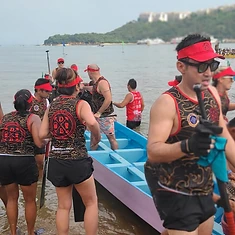 DBDB crew preparing the dragon boat on the beach