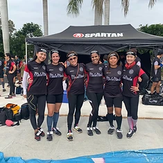 Six DBDB women in matching team gear at the Spartan race