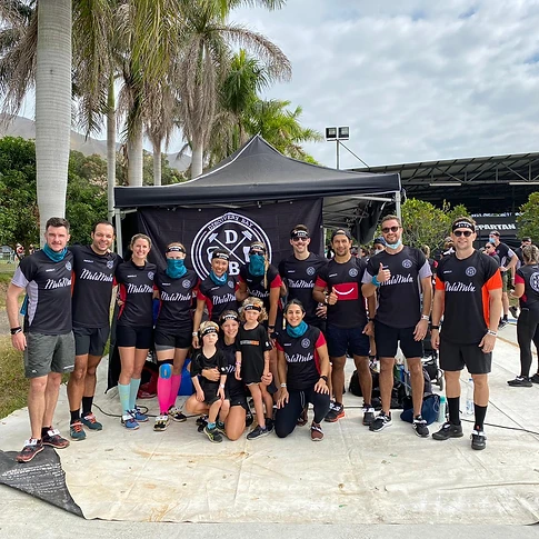 DBDB Spartan / DEKA crew posing in front of the team tent on race day