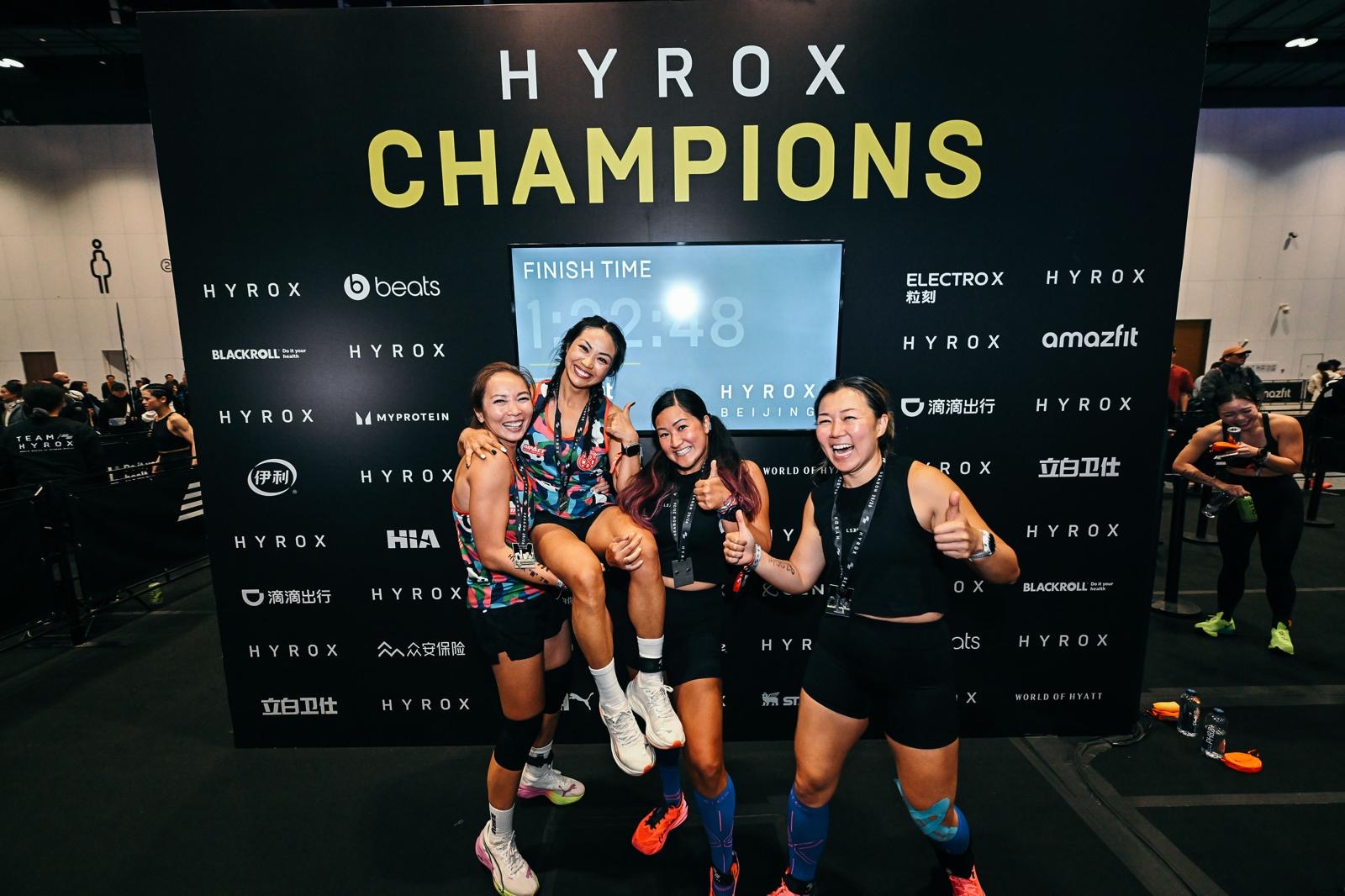 Four DBDB women celebrating a 1:22:48 finish and a championship result