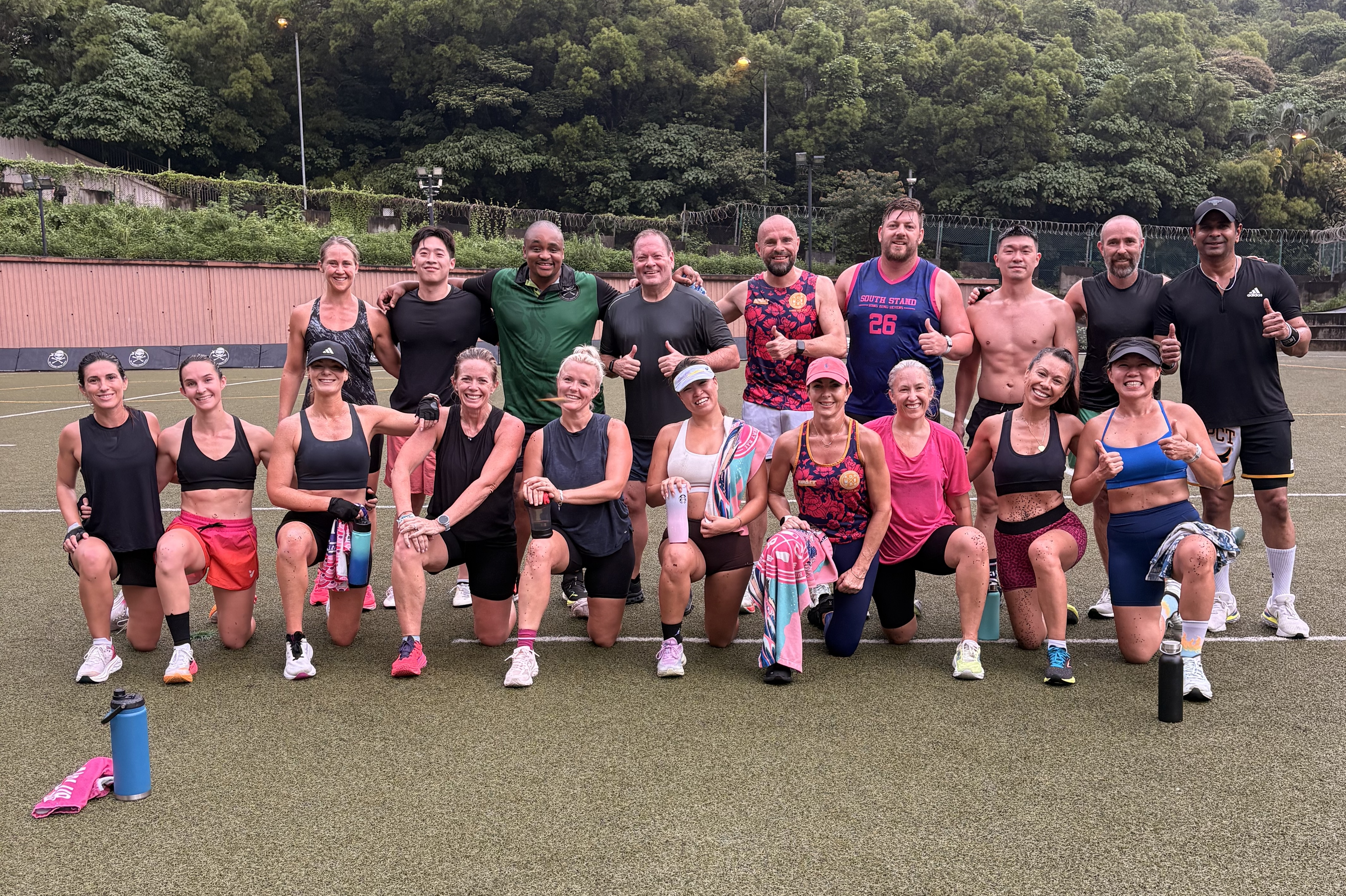 Group of DBDB members training together on the turf