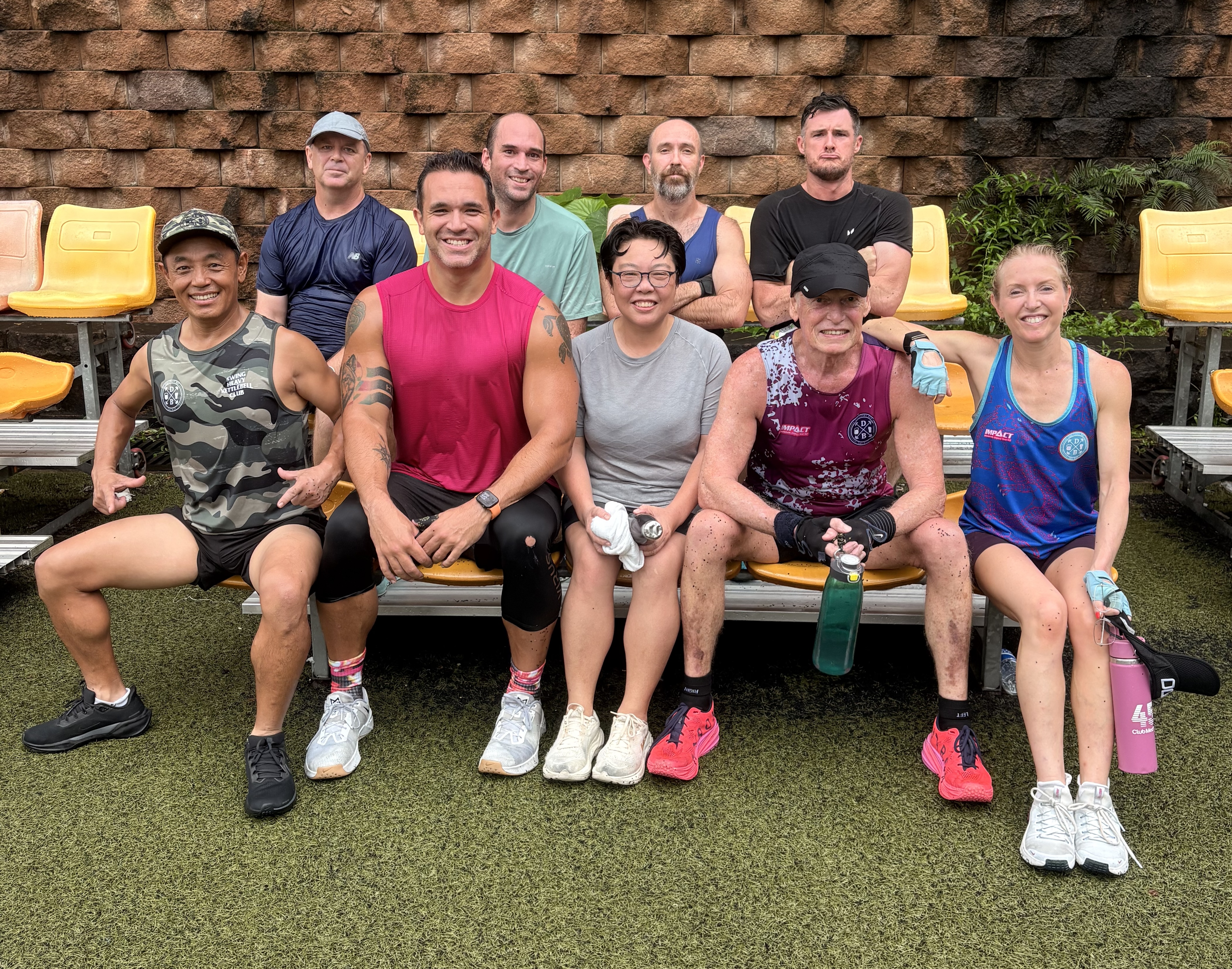 DBDB group on the bleachers after a morning session