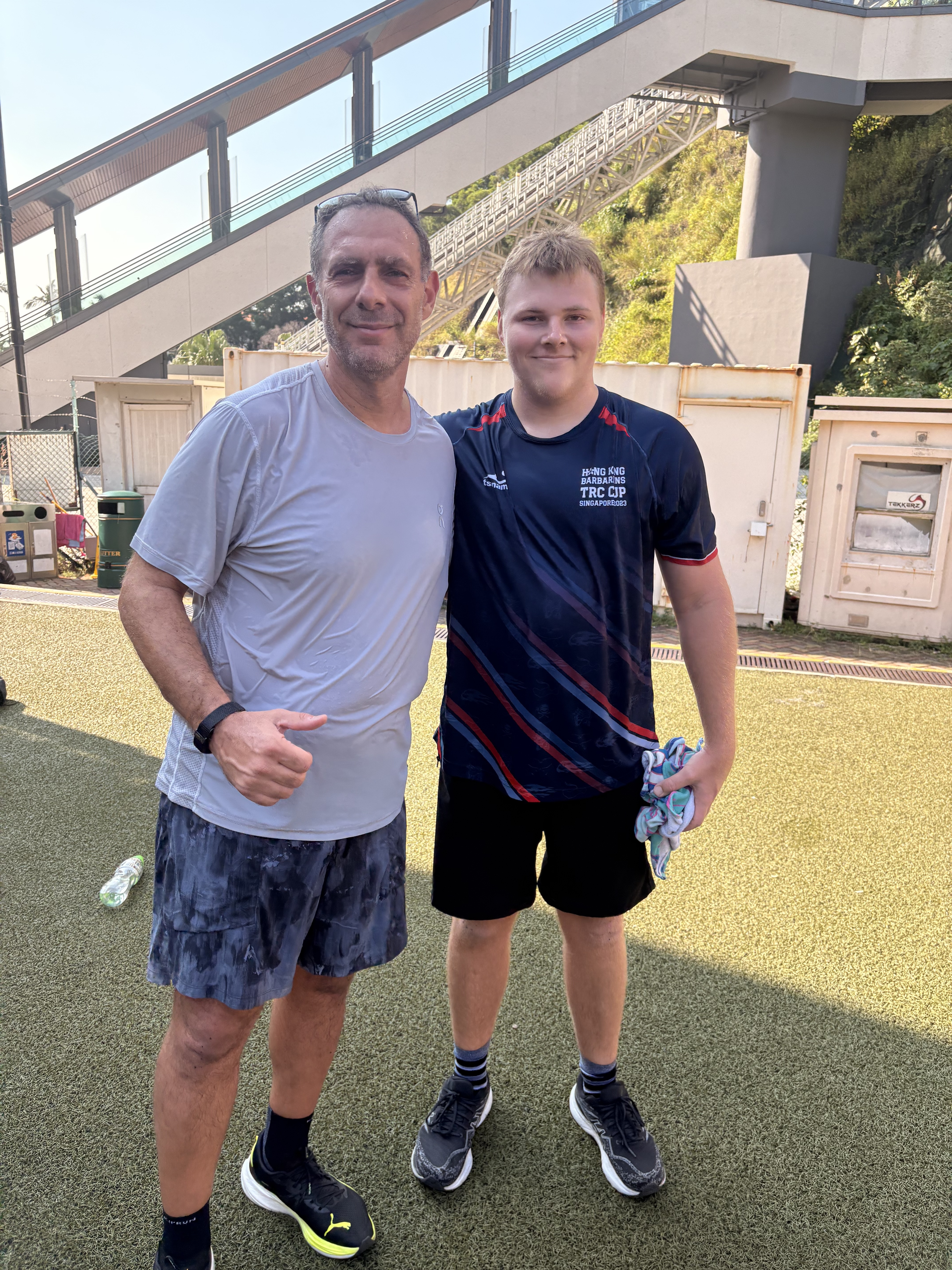Two members after a session on the DBDB open pitch — the space to train at race intensity, not gym intensity.