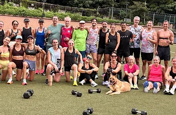Full squad of 36 members with dumbbells