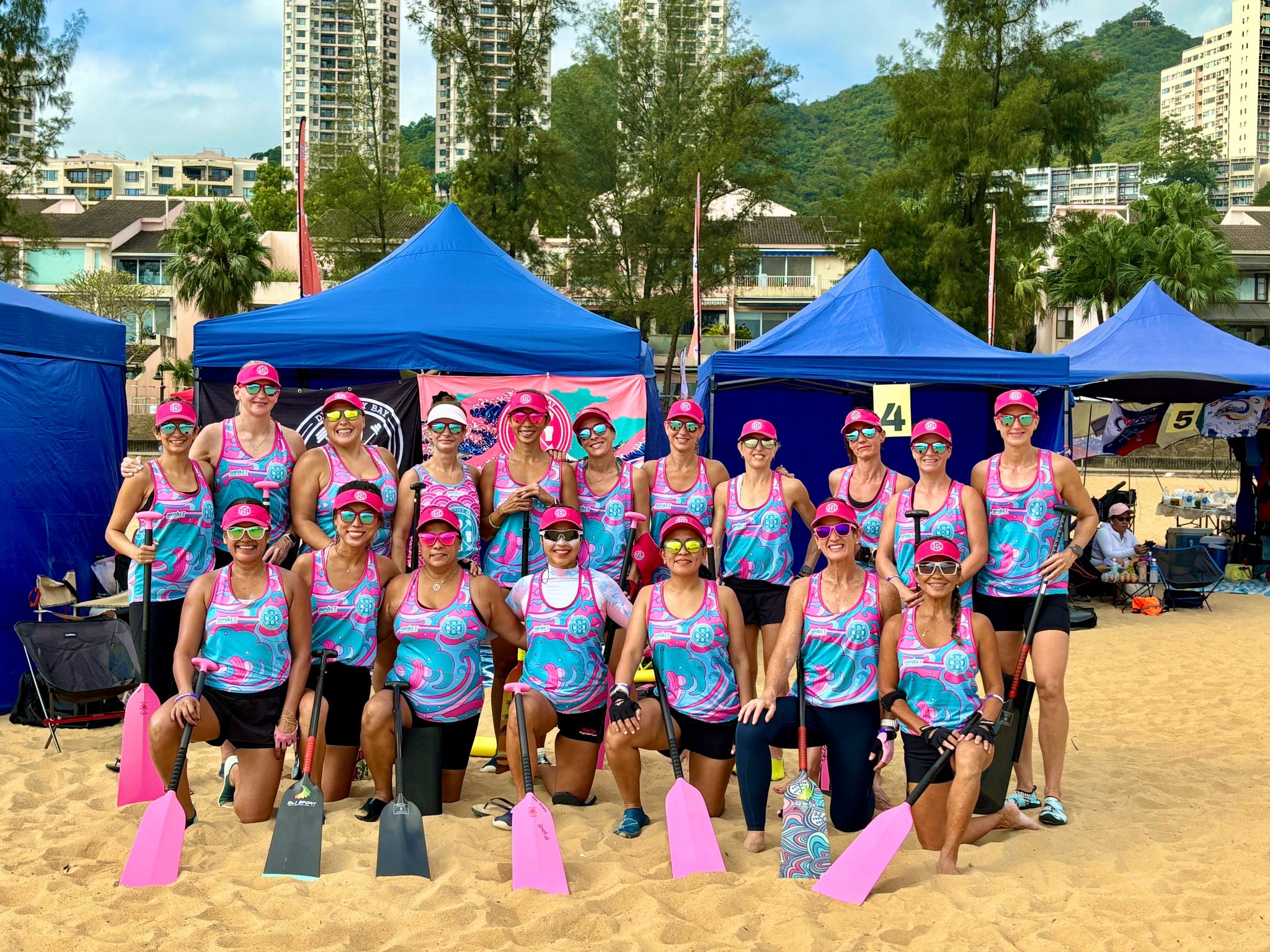 The DBDB women's crew in full race kit, ready to paddle