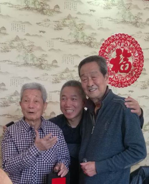 Master Yuantong Liu with Master Cao Hefang and Master Feng Guangde, two of the co-founders of the Huaxia Zhineng Qigong Center