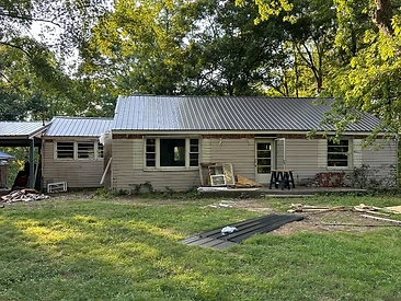 Shingle Tear-Off & Tuff-Rib Roof Replacement