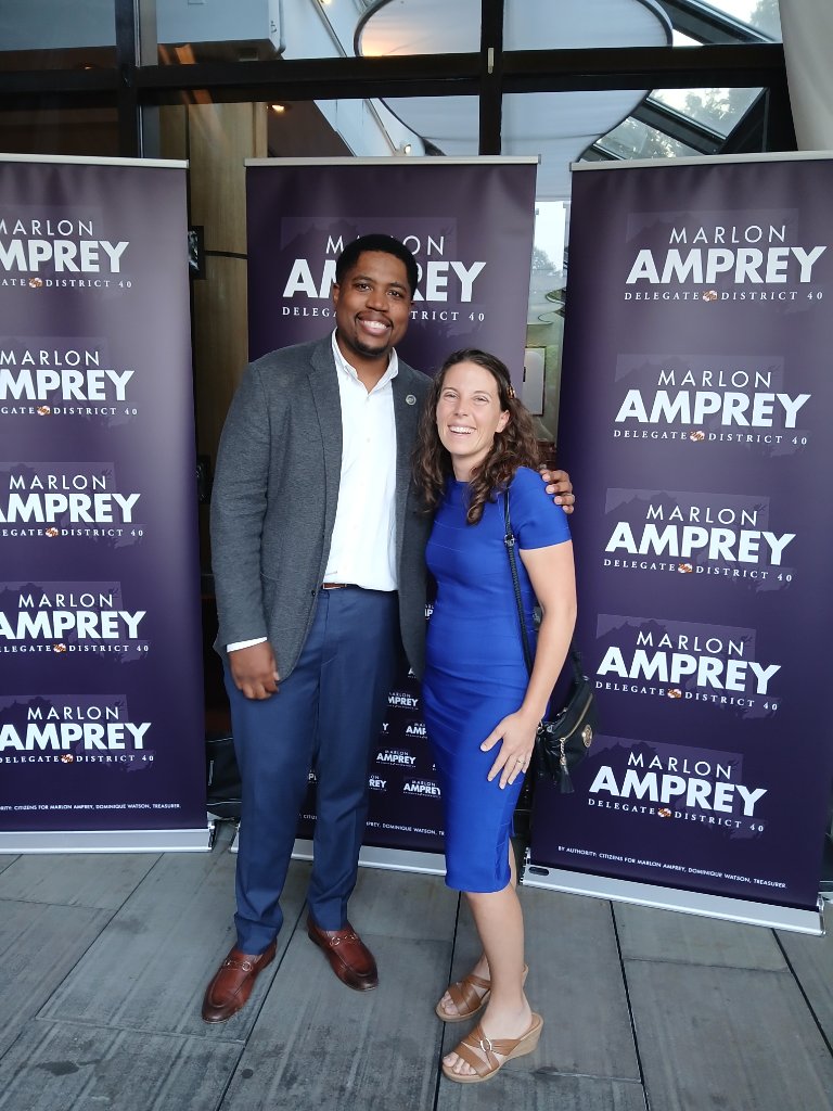 Community leaders with Marlon Amprey delegate district 40 banners