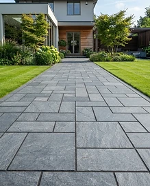 Geometric pattern natural stone pavers with lawn edges
